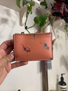 Coach Coral Leather Zip Card Case with Sunglasses Motif